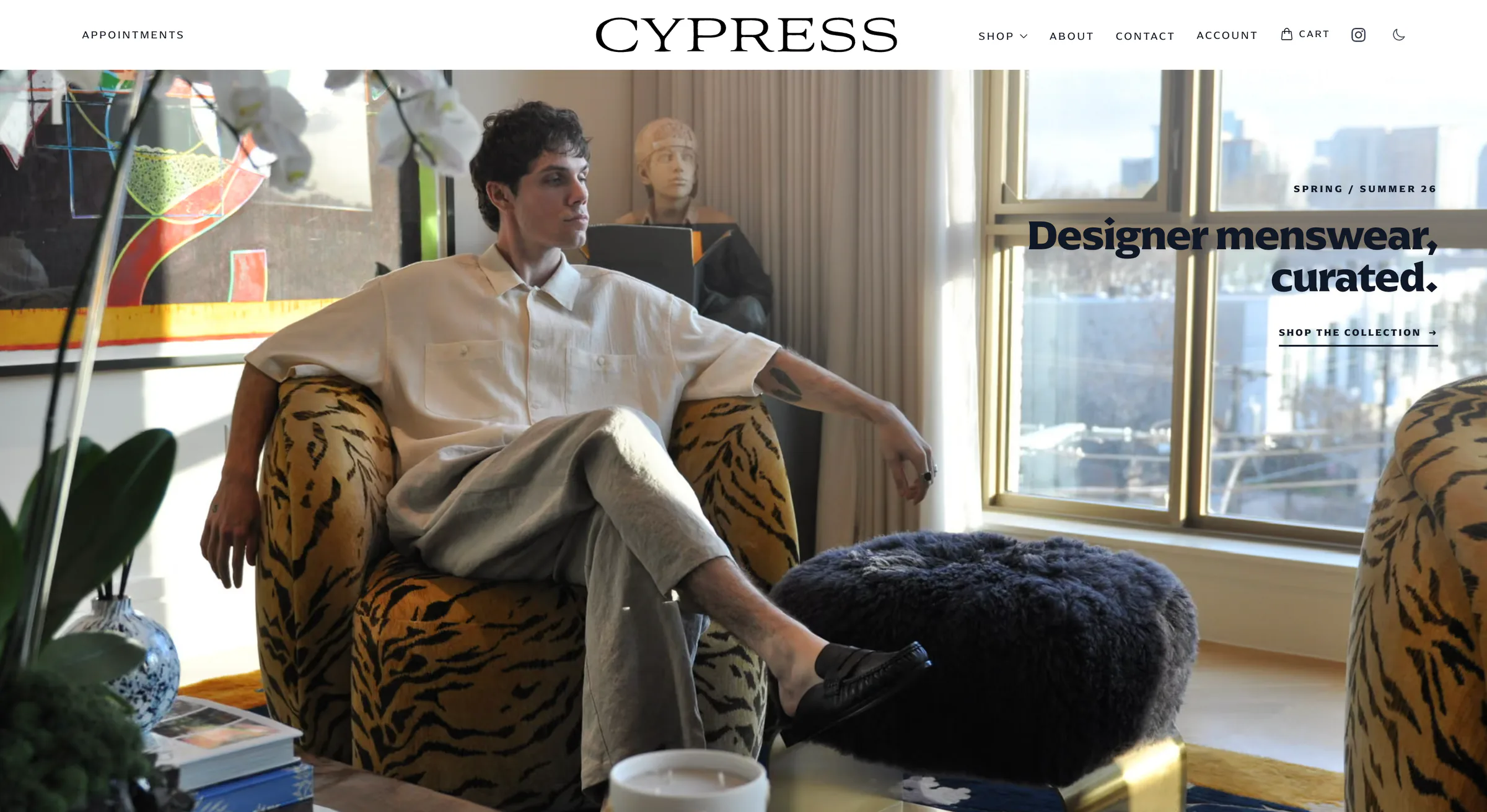 The Cypress Clothiers storefront, a headless Shopify store built with Next.js, opening on an editorial photograph and the line “Designer menswear, curated.”